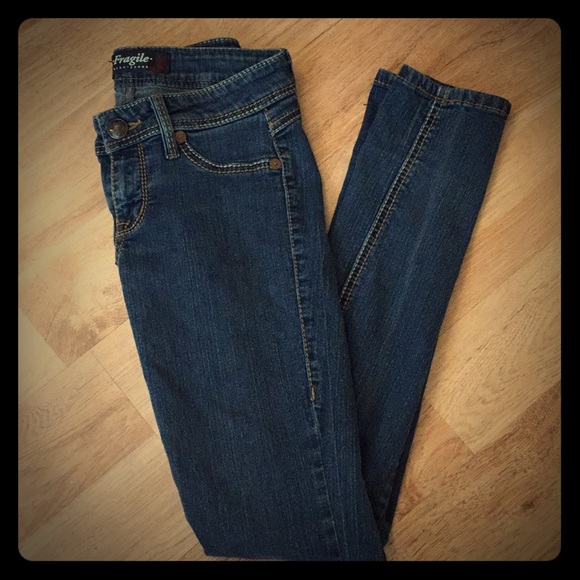 fragile blue jeans